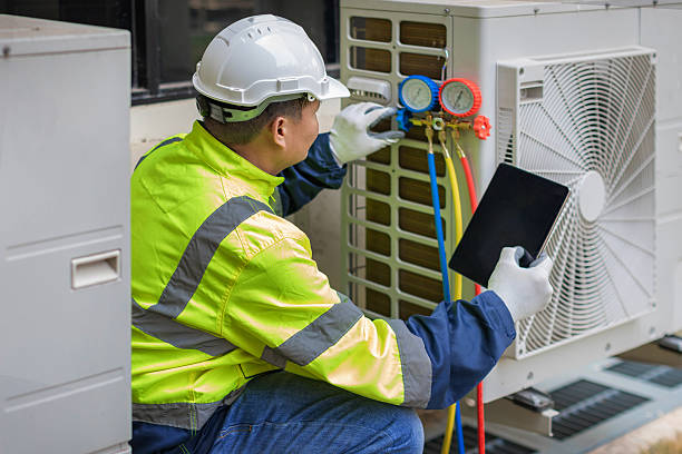 Professional Hvac technician working in Concord, MA